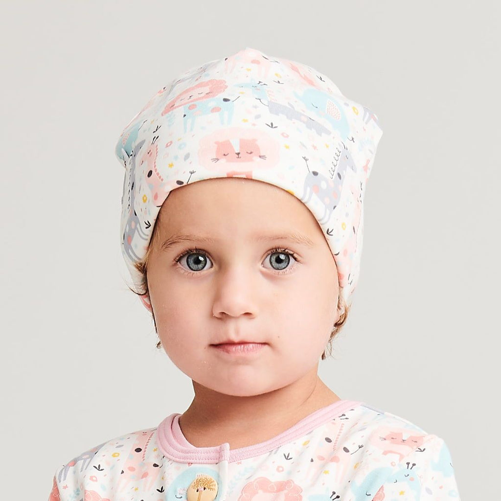 Organic lined baby hat "Mini Jungle Rose" made from 95% organic cotton and 5% elastane