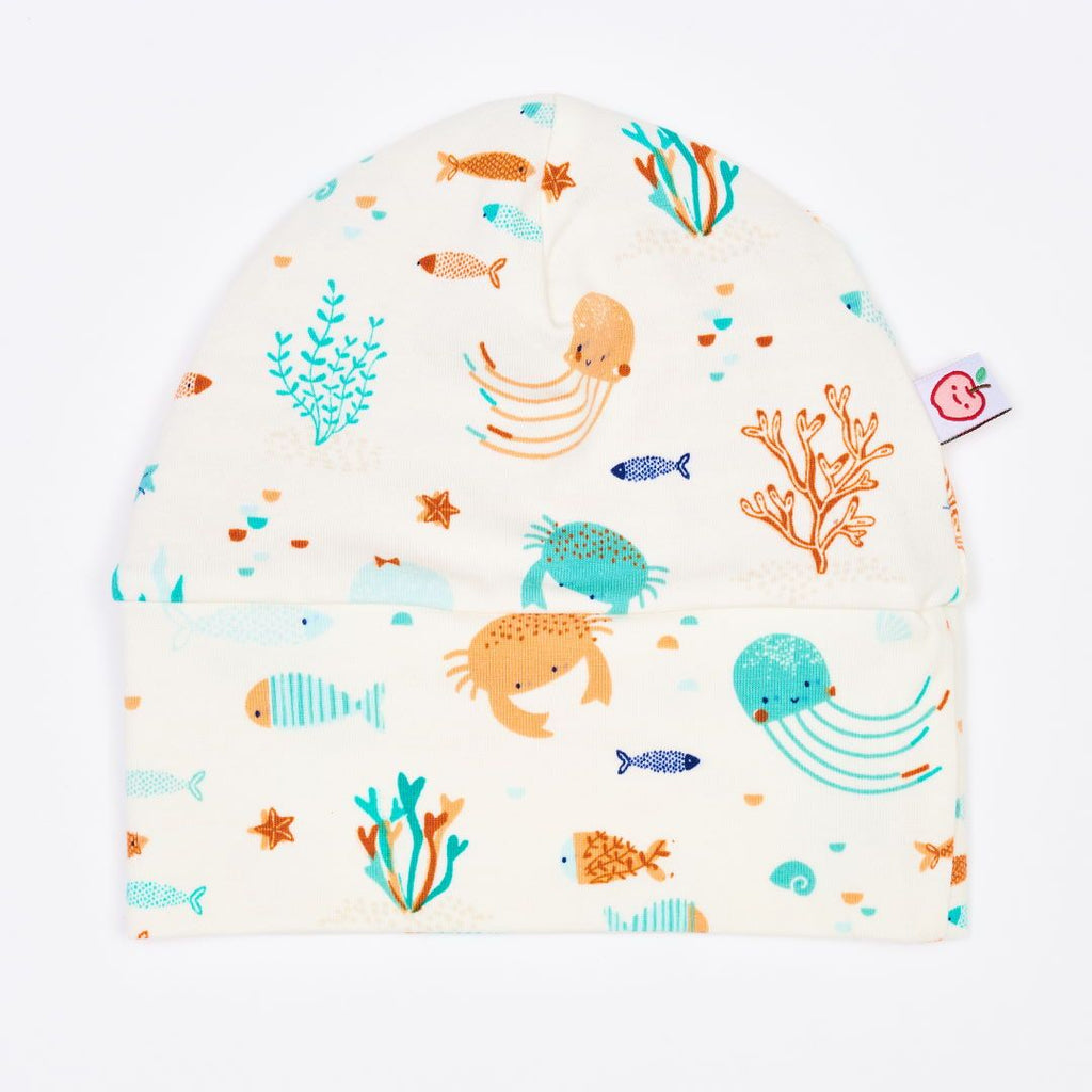 Organic lined baby hat "Ocean Party" made from 95% organic cotton and 5% elastane