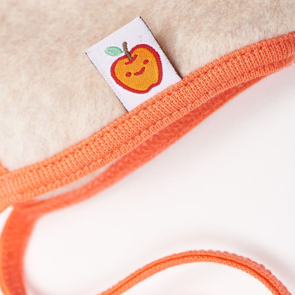 Fleece baby hat with ear flaps "Fleece Nude Marl/Apricot"