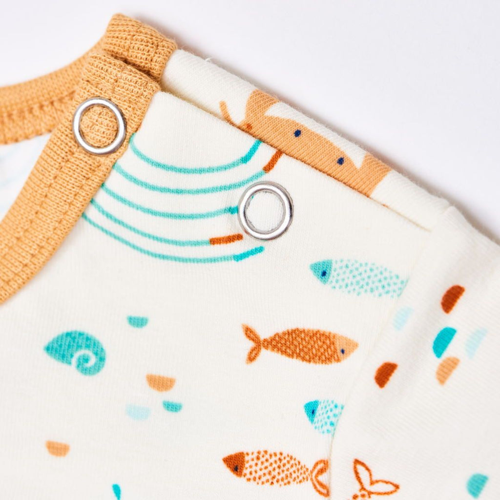Organic shortsleeved romper "Ocean Party" made from 95% organic cotton and 5% elastane